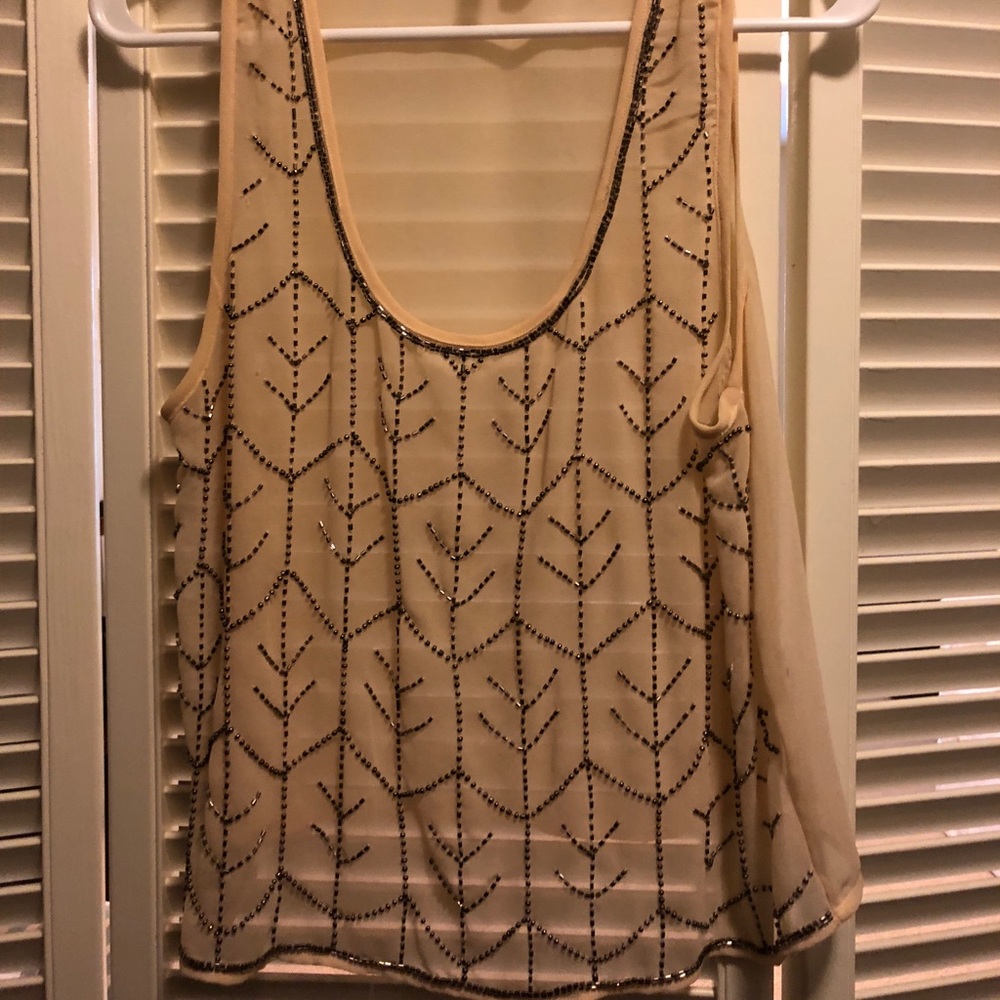 Sheer gold top